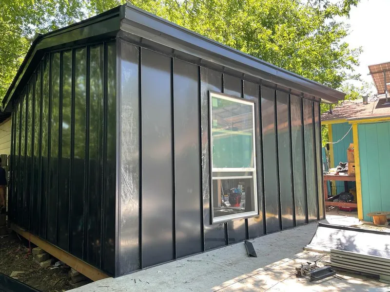 Black standing seam metal wall panels for Roof Inspection in Tempe